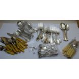 A large quantity of plated cutlery and three silver salt spoons est: £30-£50