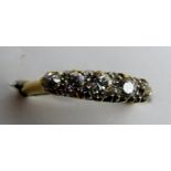 An 18ct five stone graduated diamond ring, approx 1/2ct,