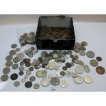 A large collection of pre-decimal coins, including silver 3d's,