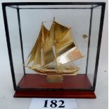 A modern Chinese gilt-metal model of a sail boat, (probably gold plate but unmarked),