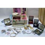 A jewellery box with an assortment of mainly vintage jewellery to include cuff links,