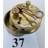 A brass scientific instrument marked 'Stanley London', cylindrical form with screw-on cover/base,