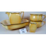 A 1920's/30's Grimwades Royal Winton yellow glazed 5 piece toilet set, comprising a jug, basin,