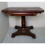 A 19th century carved rosewood turnover tea table, with a chamfered column and pedestal base,