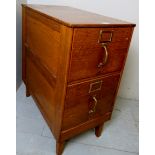 A 20th century light oak freestanding filing cabinet,