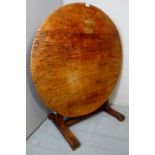 A 19th century rustic circular oak tilt top wine tasting/tavern table est: £100-£150