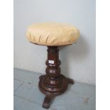 A 19th century turned mahogany adjustable stool,