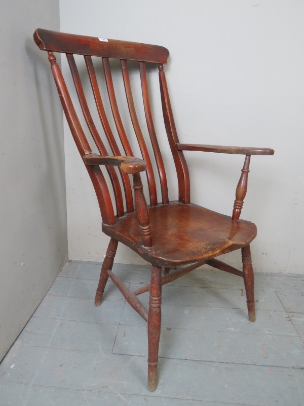A 19th century mahogany Windsor fireside chair est: £80-£120
