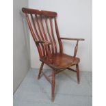 A 19th century mahogany Windsor fireside chair est: £80-£120