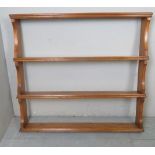 A 19th century pine wall hanging open plate rack,