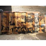 A monumental and highly decorative Chinese lacquered 12 fold screen, c.
