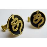 A pair of 18ct gold and black enamel cuf