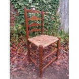 A country rush seated ladder back chair