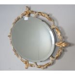 A 20th century metal oval wall mirror pa