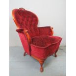 A 20th Century armchair upholstered in b