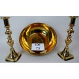 A pair of Victorian brass candlesticks,