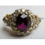 A natural ruby and diamond cluster ring,