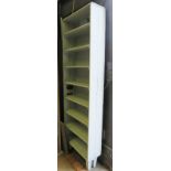 A 20th century painted open bookcase wit