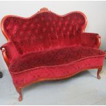 A 20th Century two seater sofa upholster