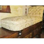 A Victorian mahogany framed chaise lounge upholstered in cream material (slightly a/f) est:
