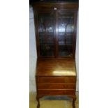 A 20th century mahogany bureau bookcase