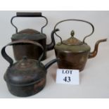 Three Victorian copper kettles, one bein