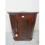 A small 19th Century mahogany wall hangi