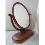 A Victorian carved mahogany oval table t