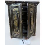 A 19th century Chinese export black lacquered table top cabinet decorated with gilt Chinoiserie,