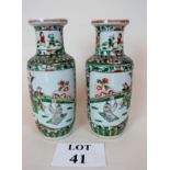 A pair of damaged Chinese famille verte rouleau vases,