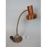 A vintage angle-poise lamp in copper finish est: £20-£40