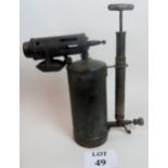 A large antique blow torch, heavily patinated brass body, made by Swedish company,