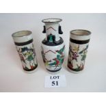 Three early 20th century Chinese vases decorated with warriors on horseback on a crackled ivory