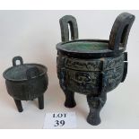 Two Chinese archaic-type bronze tripod censors, but of later construction,