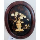 A 19th century oriental oval framed floral carving in ivory & bone, a/f,