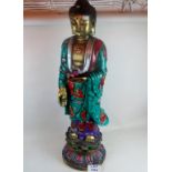 A large and decorative Indian statue in
