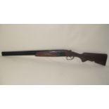 A Baikal 12 bore over and under shotgun,