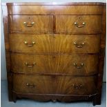 A large walnut bow front chest of two sh