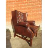 A 20th Century mahogany framed wing back