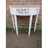 A small 20th Century white painted demi-