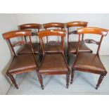 A superb set of six Regency rosewood din