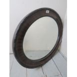 A 19th Century mahogany oval wall mirror