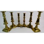 Three pairs of 19th century brass candlesticks est: £30-£50