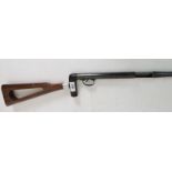 A 410 shooting walking stick with removable stock grip and an enclosed trigger, (U.
