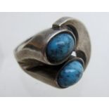 A turquoise ring, stamped 'sterling' 925,