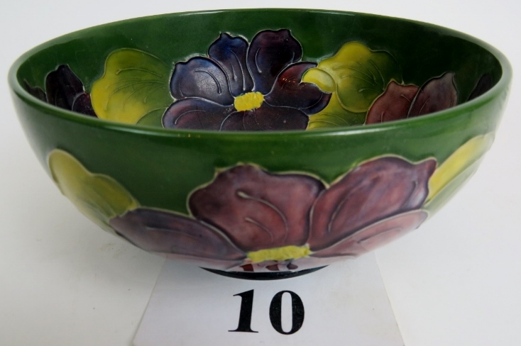 A Moorcroft bowl, tapered circular form terminating on a foot,