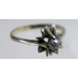 An unmarked diamond solitaire ring, 0.