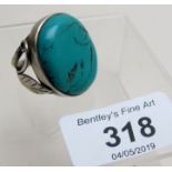 An old silver set turquoise ring, marked 925,