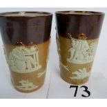 A pair of Doulton stoneware beakers, c.