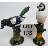 Two vintage Tuscan china models of birds perched on branches,